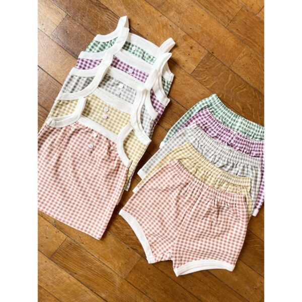 b1d427c6-1db3-4674-be2b-cf80b576986e_1200x1200_fill.jpg Set top senza maniche e pantaloni Remi